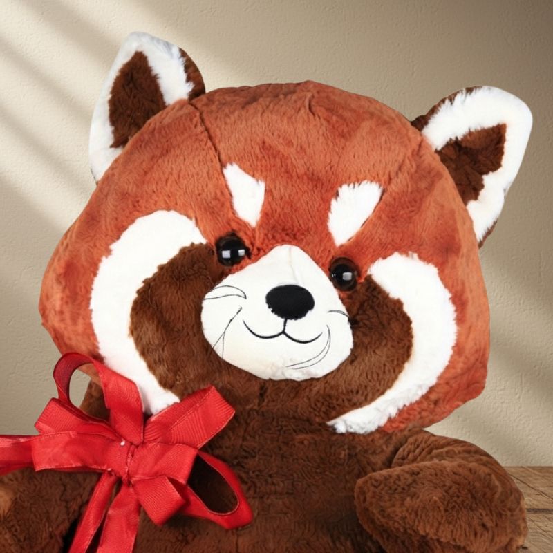 Regalo con peluche de panda rojo y chocolates Ferrero Rocher