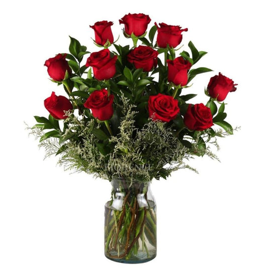 12 Roses in a glass vase
